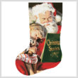 cross stitch pattern Christmas Stories Stocking (Left)