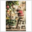 cross stitch pattern Bunnies Decorating Tree