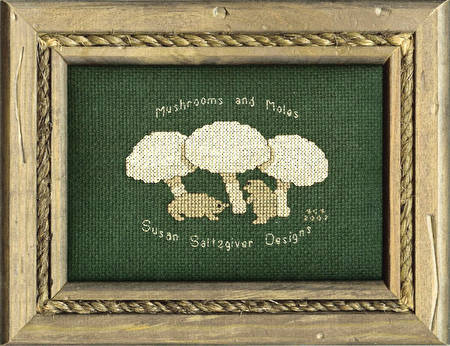 cross stitch pattern Mushrooms and Moles Logo